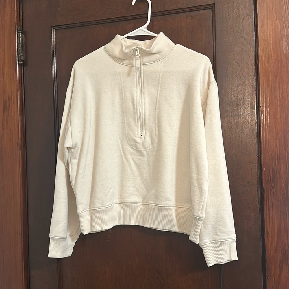 White zip up sweater